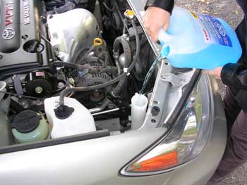 Adding windshield washer fluid